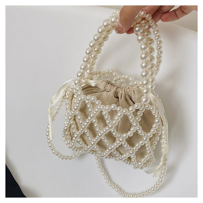 2022 New Niche All-match High-quality Beach Hollow Woven Pearl Acrylic Material Fashion Dinner Daily Crossbody Bags for Women